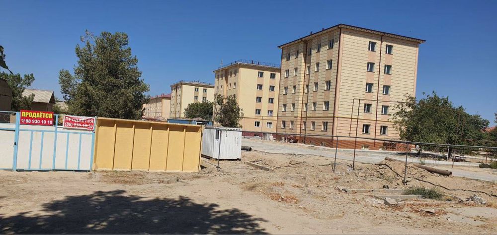 Бизнес учун жой! 21 соток йул буйида.