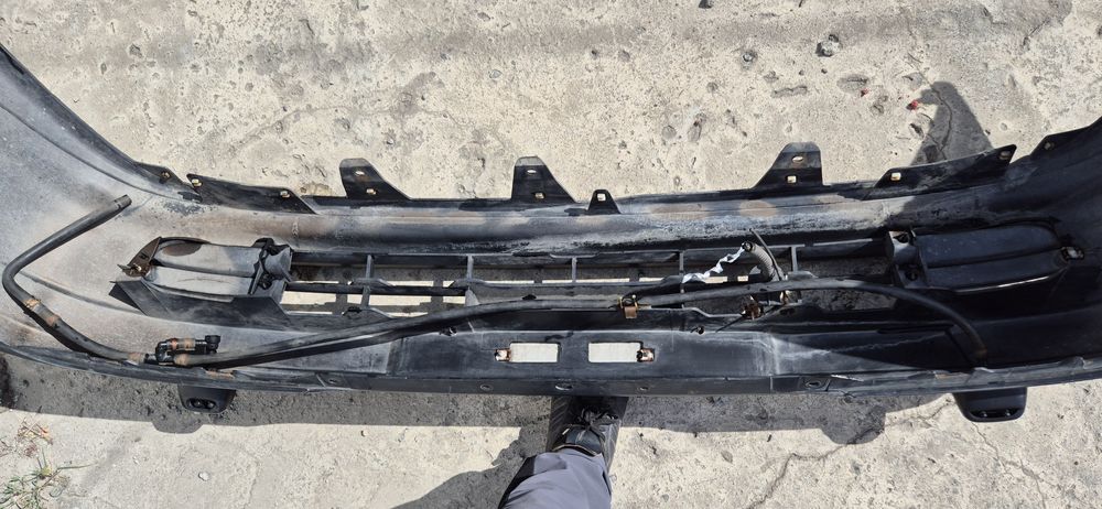 Бампер на Карину е  с амывательом фар