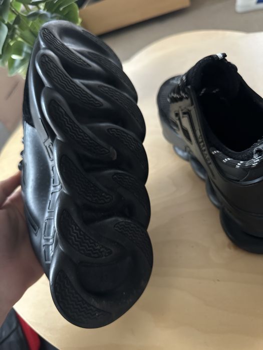 Versace chain reaction