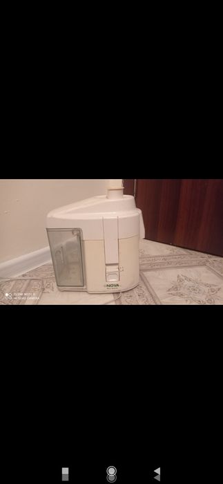 Соковыжималка,рабочая.