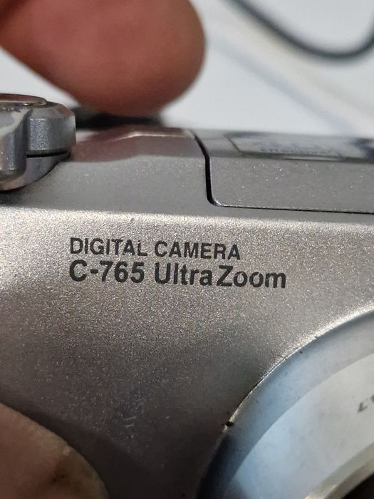 Aparat foto Olympus Corporation  NO: C-765, funcțional la priza