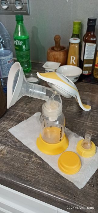 Молокоотсос Medela