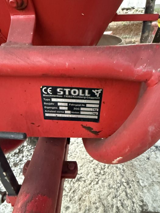 Sararita motocultor Stoll . Dispozitiv de imprastiat