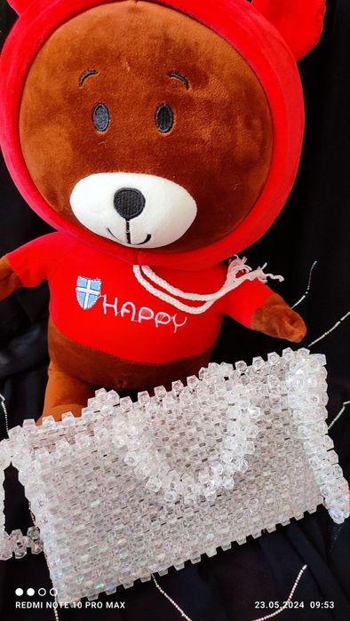 Trenddagi munchoqli sumka