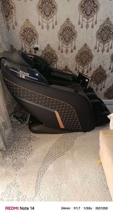 Массажный кресло