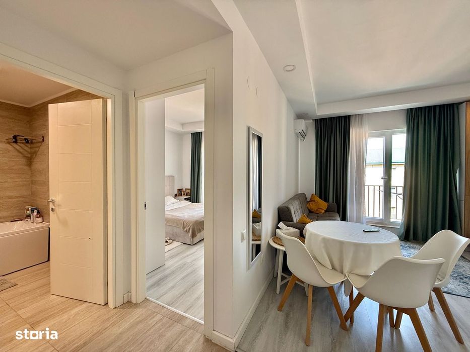 COSMOPOLIS - Apartament cu 2 camere tip studio, mobilat si utilat.