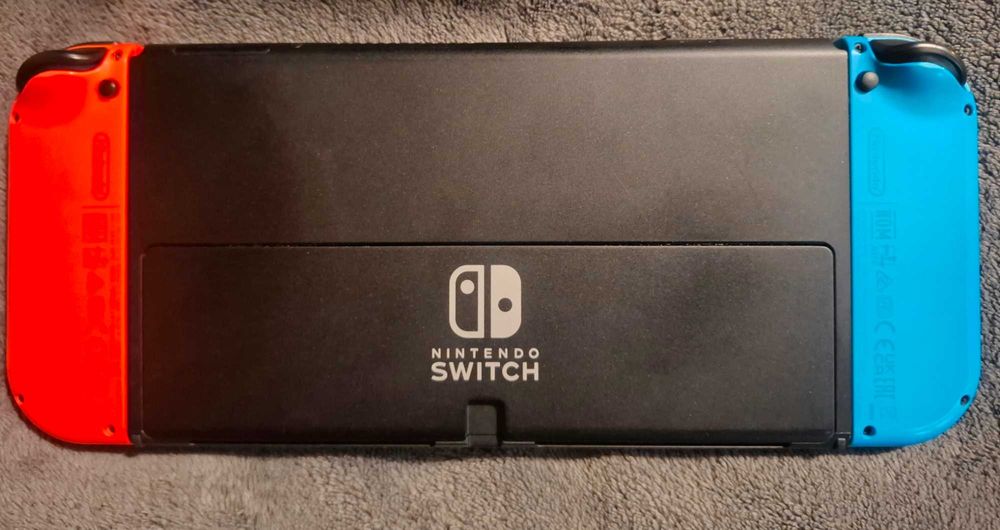 Nintendo Switch OLED Edition (пълен комплект) + допълнителна памет + калъф + акаунт със 7 топ игри