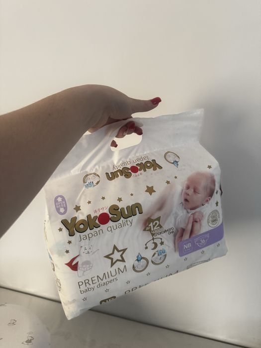 продам 2 пачки новых памперсов