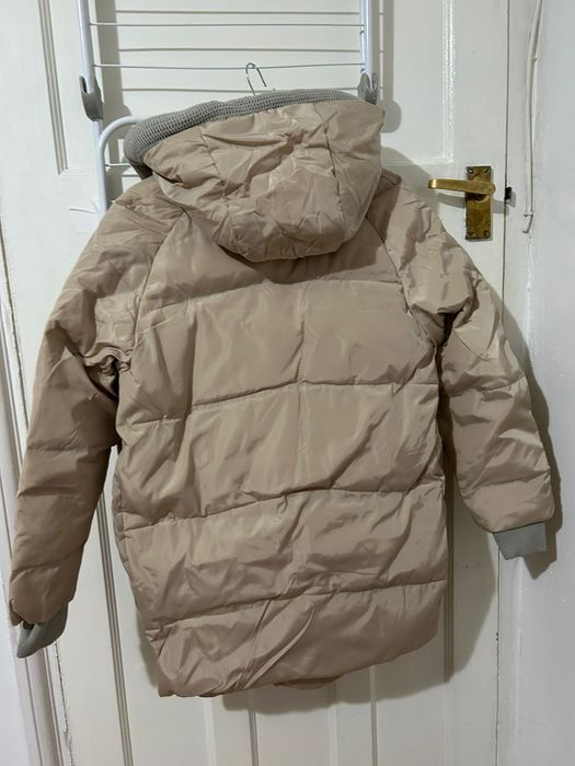 Дамско бежово зимно яке