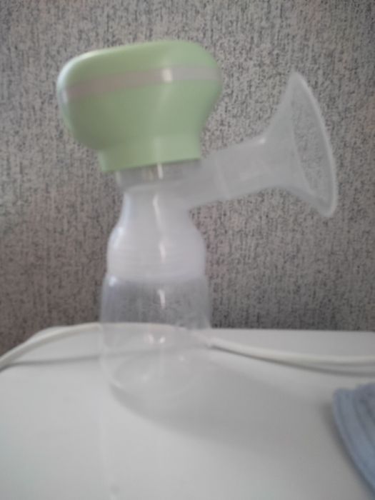 Продам электрический молокоотсос