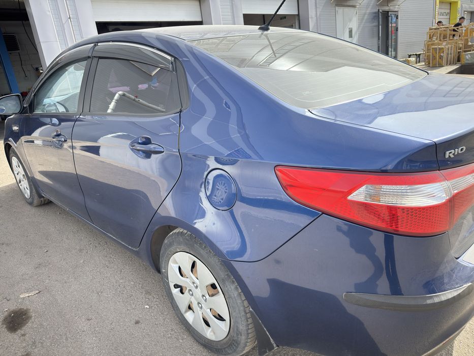 Легковая машина Kia Rio 2014