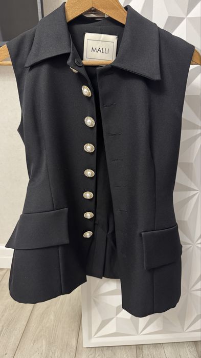 Продам жилет Малли