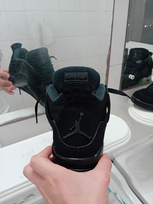 Jordan 4 black cat