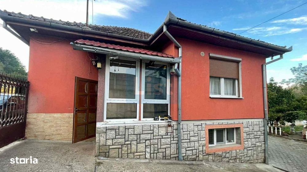 Casa 7 camere, teren 590 mp in Calnic