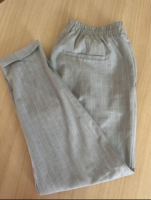 Pantaloni eleganti cu dungi