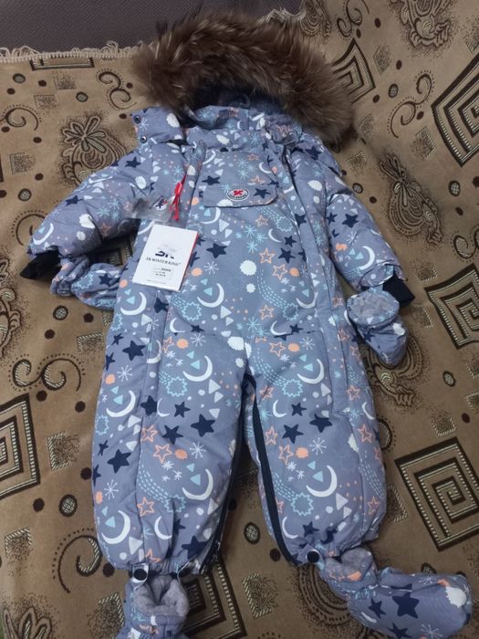 Продам комбинезоны новые