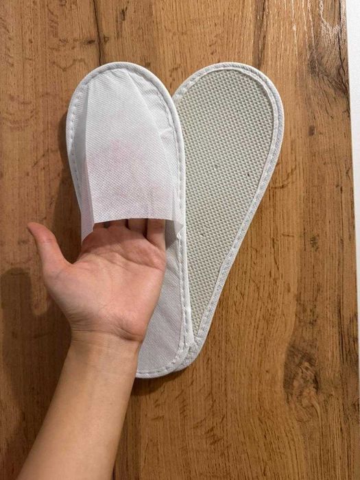 Одноразовые тапочки для гостиниц спа итд