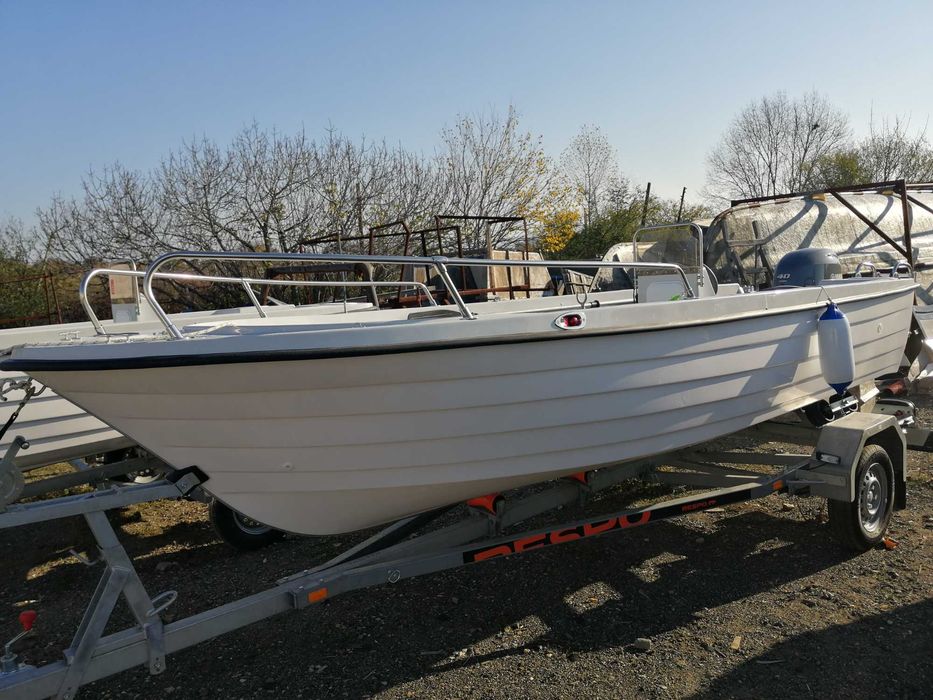 Barca + motor+peridoc