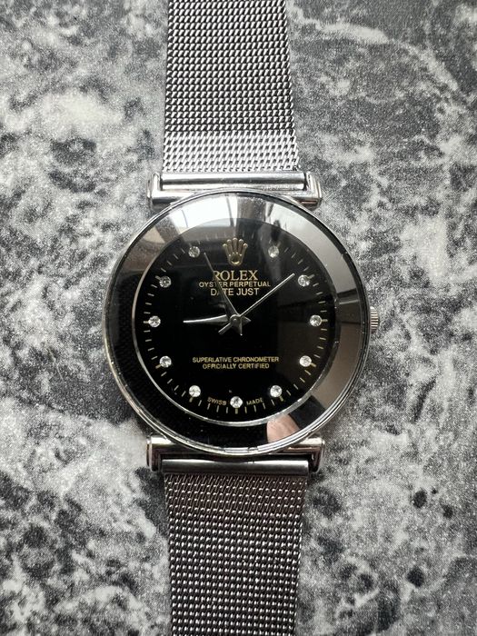 Часовници Omega и Rolex
