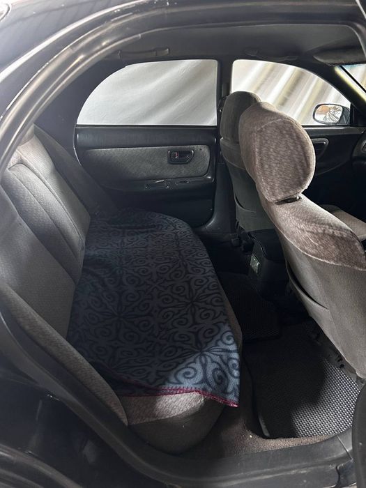 Тайота карона эксив