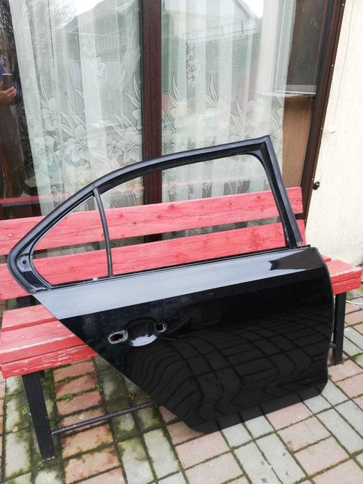 Usa portiera dreapta spate dezechipata Volkswagen Jetta 2016