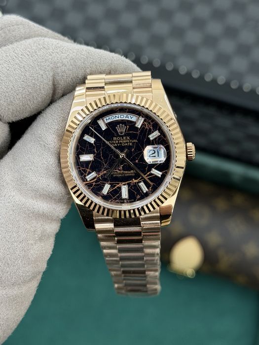 Rolex Day-Date 40 Baguette Eisenkiesel