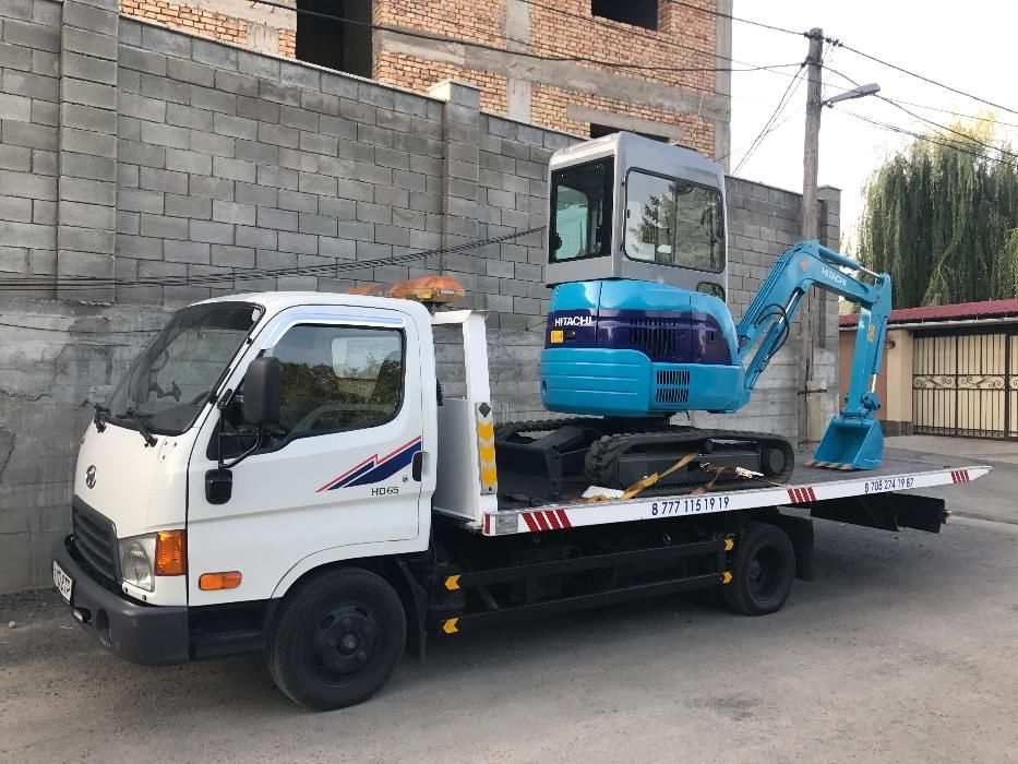 Услуги мини экскаватор .. экскаватор .. трактор ..HITACHI EX30UR-2