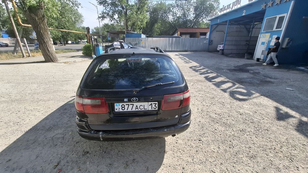 Таиота Карина Е 1995 газ