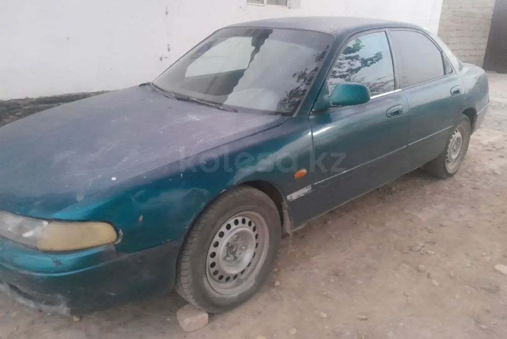 Мазда Кронос по запчастям.