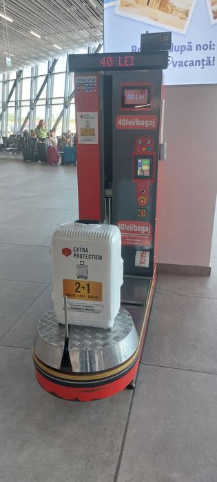 Aparat automat de infoliat bagaje