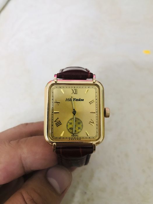 Мактайм часы золотые