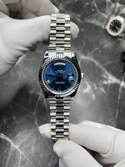 Часы Rolex, Patek Philippe