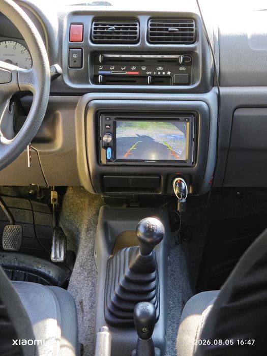 Autoturism SUZUKI Jimny  4WD