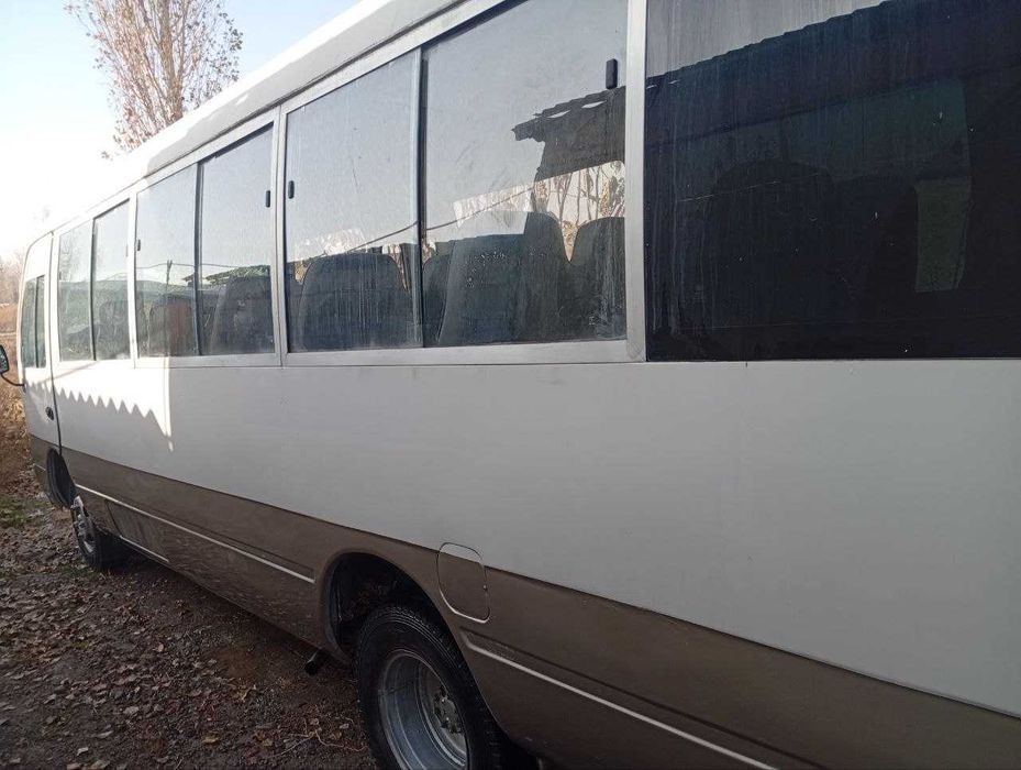 Тойота Коастер микроавтобус 28 ўринли сотилади.