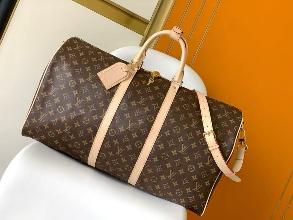 Сумка Keepall 45 cm с плечевым ремнем Louis Vuitton