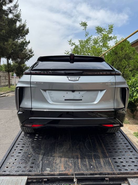 Cadillac Lyric ev электросамокат