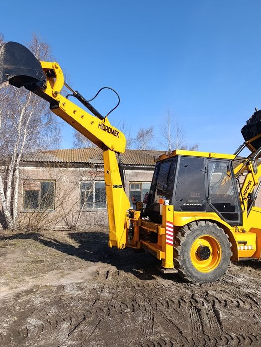 Продам экскаватор погрузчик