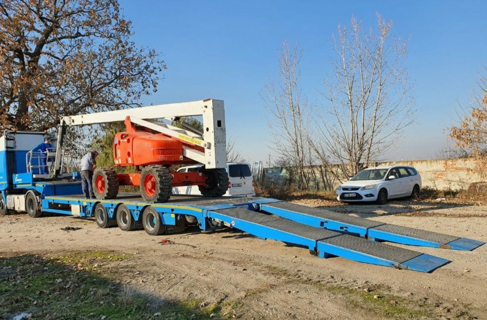 Transport utilaje trailer rampe hidraulice putem incarca orice