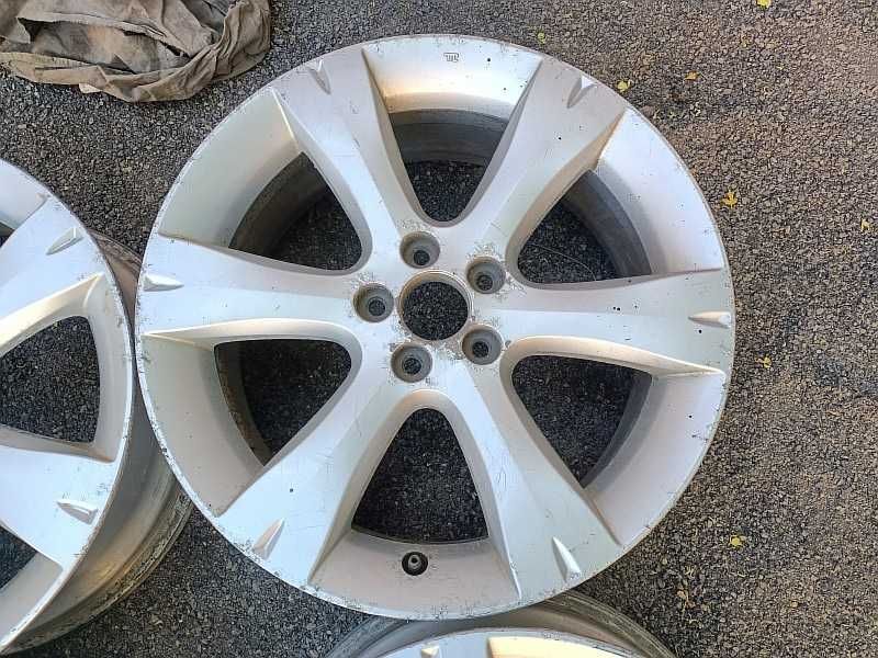 Продам оригинальные легкосплавные диски на автомашину Subaru