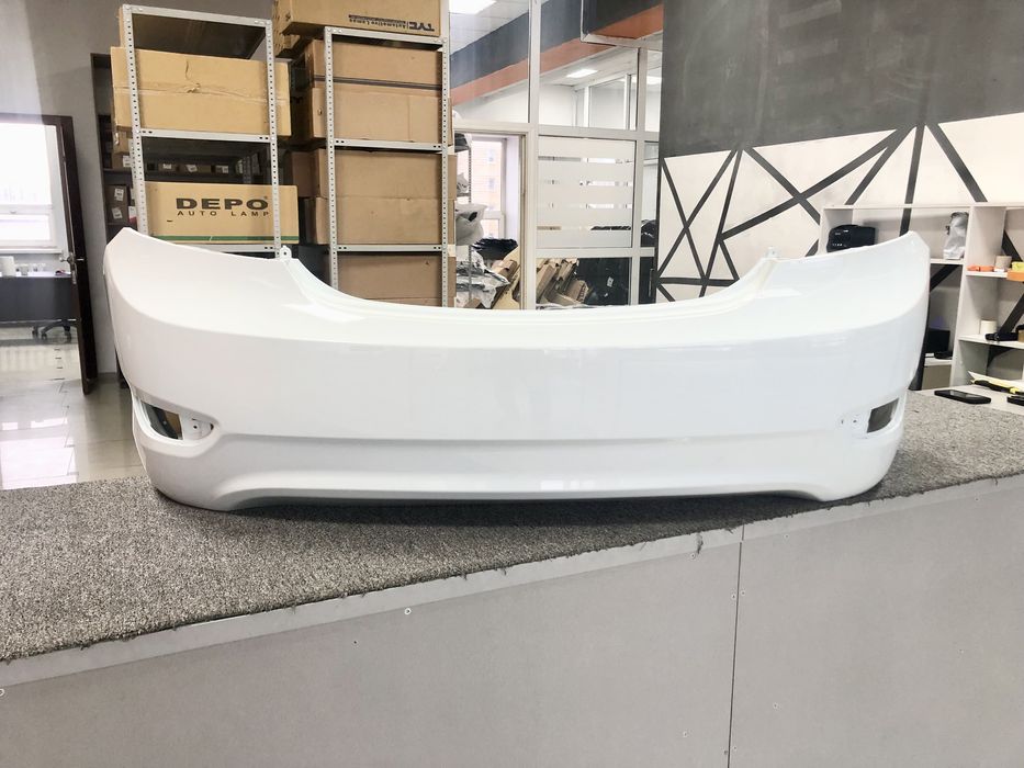 Задний бампер белый Акцент/Солярис 10 14