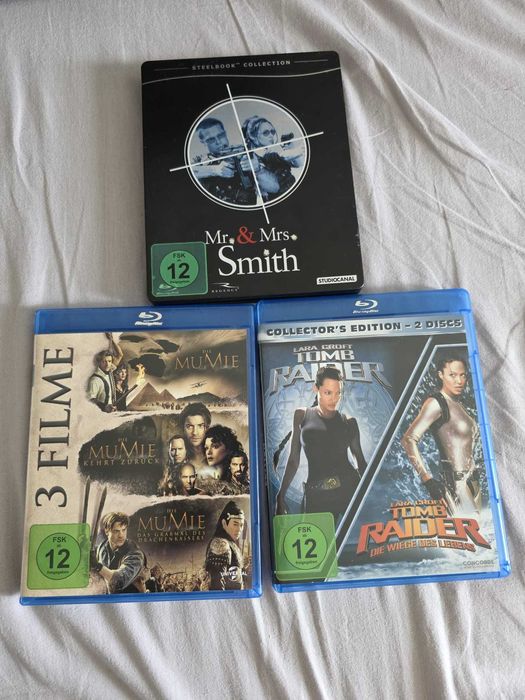 Set 6 filme adventure bluray dintre care unul de colectie steelbook Mr and Mrs Smith, trilogia Mumia si seria Tomb Raider