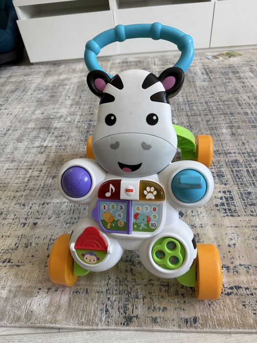 Fisher Price - premergator zebra cu sunete si lumini