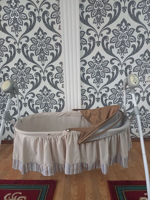 Детская люлька с автоматическим покачиванием