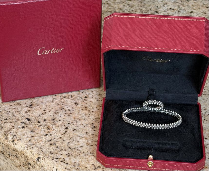 Гривна и пръстен Clash de Cartier