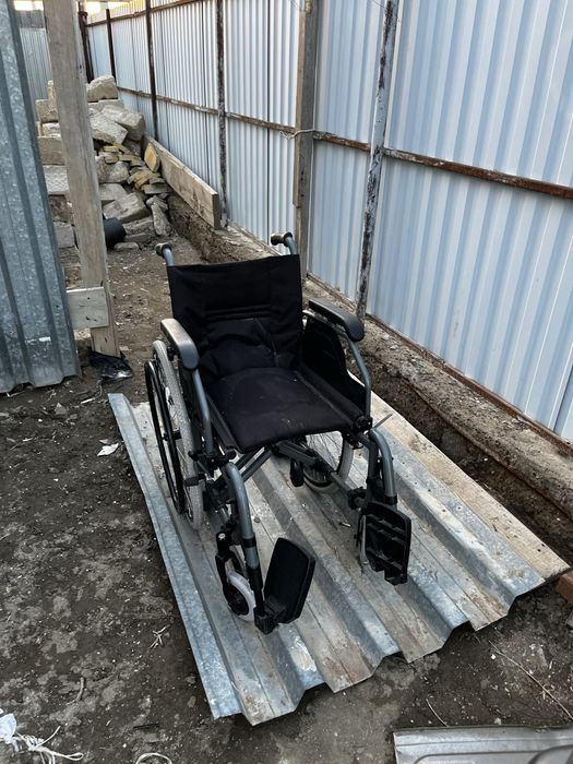Инвалидный коляска