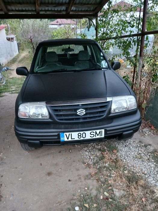 Suzuki Grand Vitara sau schimb cu mașina de teren cu bena