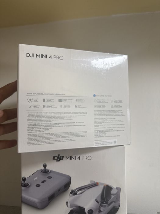 Drona dji mini 4 pro noua sigilata cu telecomanda si o baterie