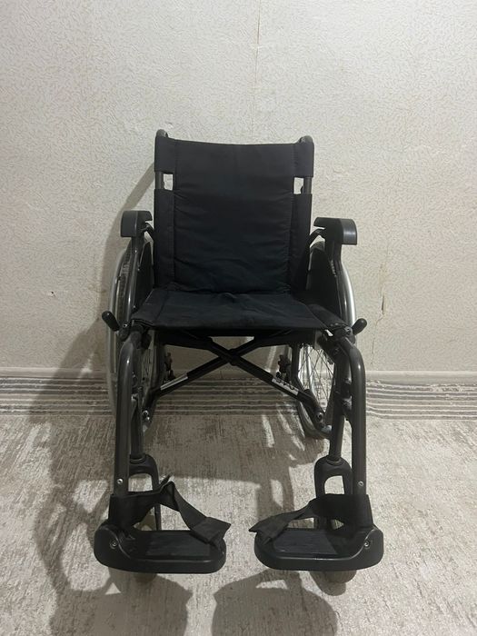Инвалидная коляска