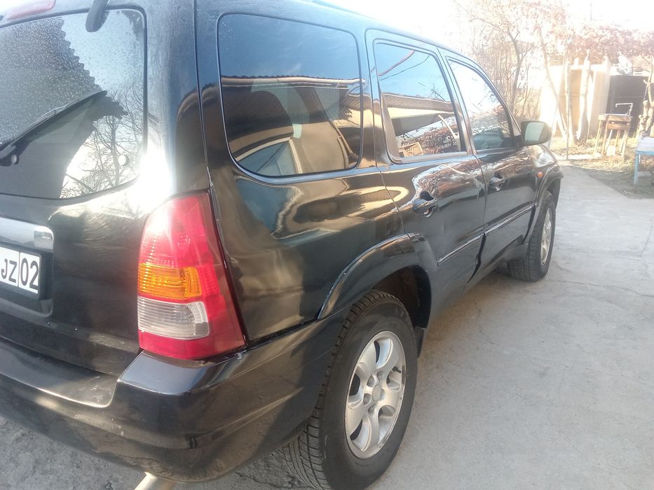 Продам срочно Mazda Tribute