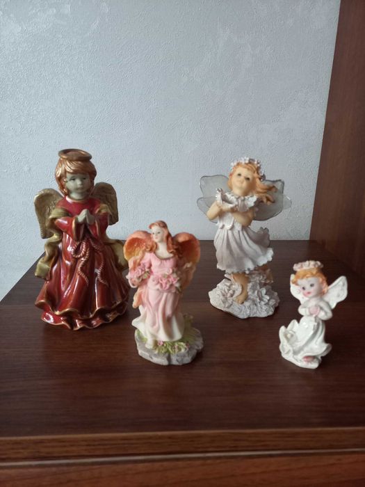 Продам статуэтки: ангелы, барс.